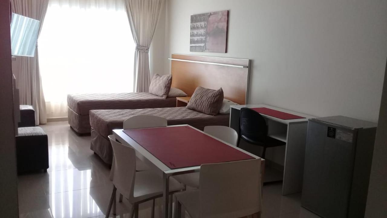 Illia 121 Apart Hotel Neuquén Kamer foto