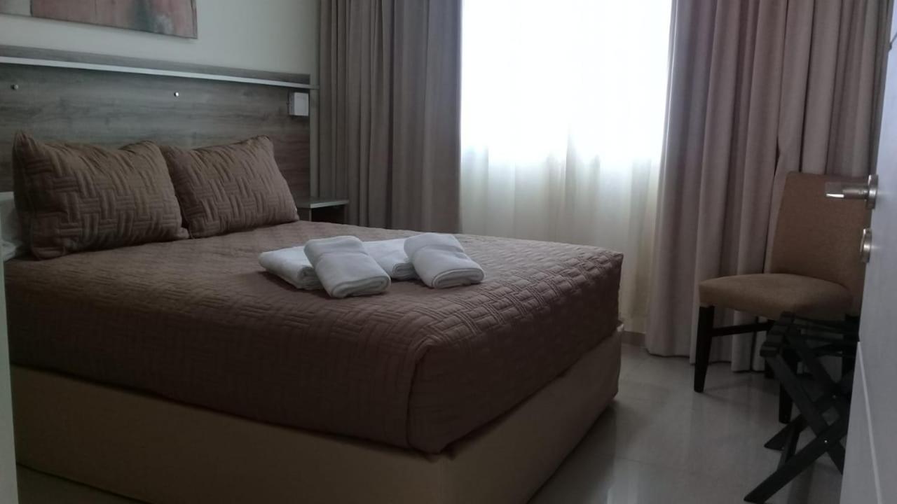 Illia 121 Apart Hotel Neuquén Kamer foto